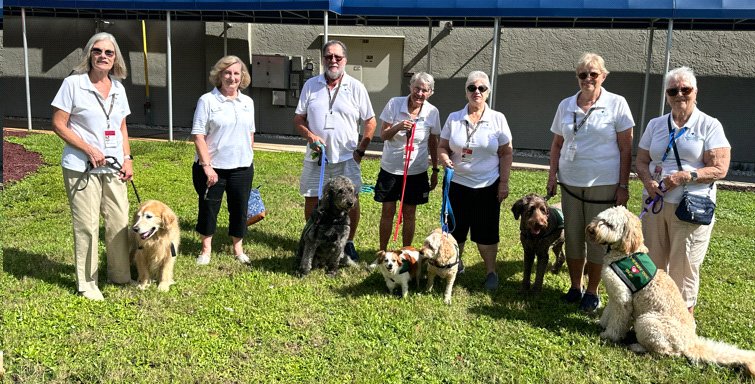 SHS pet therapy team with dogs on leash